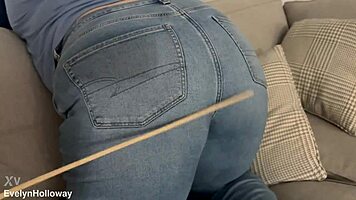 i crave the sharp cane strikes on my big ass through tight jeans stinging so deliciously