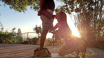 I got caught outdoor, now deepthroating BBC on sunset balcony like a slave