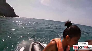 thai teen girlfriend deepthroats boyfriend's monster cock outdoors