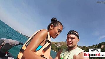 thai teen girlfriend deepthroats boyfriend's monster cock outdoors