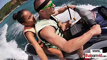 thai teen girlfriend deepthroats boyfriend's monster cock outdoors