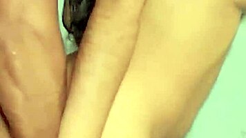 brunette latina milf handjobs huge cock against wall moaning