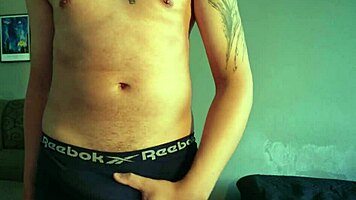 nerd brazilian strips underwear and jerks big cock moaning loud