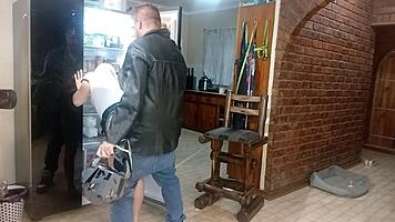 Biker pounds blonde babe's wet pussy against kitchen fridge