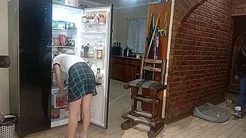 Biker pounds blonde babe's wet pussy against kitchen fridge