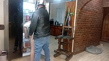 Biker pounds blonde babe's wet pussy against kitchen fridge