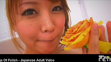 check out this hot japanese babe's big tits shining in her flower bath recording