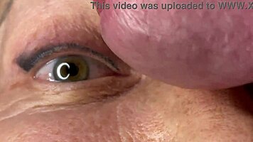 mature lady takes huge facecum load right on her eyes