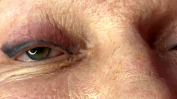 mature lady takes huge facecum load right on her eyes