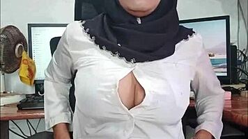 Hijab Asian ladyboy strokes cock in seductive solo tease