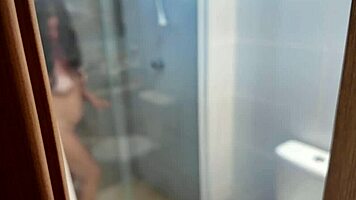 Busty MILF Eyes Thick Cock in Steamy Shower