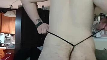 Big ass crossdresser teases thong shake