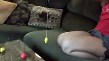 petite teen strips clothes and fingers shaved pussy on sofa