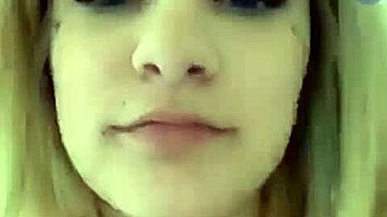 blonde teen strips topless on webcam shaking her big tits and ass seductively