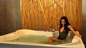 Petite Brunette Teases Her Sexy Ass and Small Tits in Steamy Jacuzzi