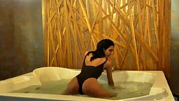 Petite Brunette Teases Her Sexy Ass and Small Tits in Steamy Jacuzzi