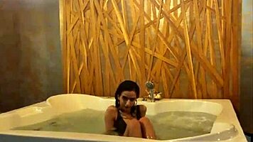 Petite Brunette Teases Her Sexy Ass and Small Tits in Steamy Jacuzzi