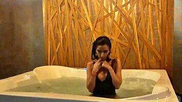 Petite Brunette Teases Her Sexy Ass and Small Tits in Steamy Jacuzzi