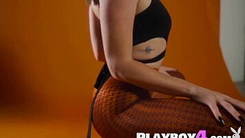 hey check out this sexy model stripping leggings showing her big natural ass