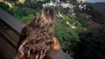 Naughty nerdy Brazilian shares her wet pussy on the balcony anyone watching?