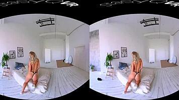 Busty blonde teen teases huge tits erotically in immersive VR solo scene