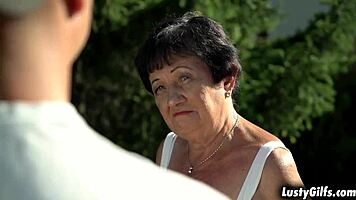 hettie cougar slurps thick young rod while soaking her tight mature pussy wet