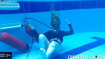 horny ashlee rose soaks wet pussy in slutty scuba dress underwater
