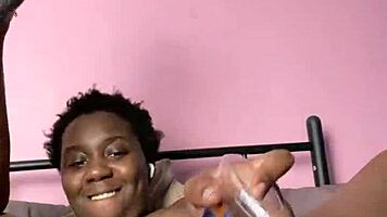ebony beauty fingers wet hairy pussy with bottle then creamy cum finish