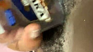 ebony beauty fingers wet hairy pussy with bottle then creamy cum finish