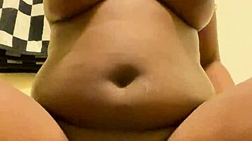 pretty girl shows her shaved trimmed pussy with big puffy lips