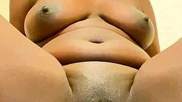 pretty girl shows her shaved trimmed pussy with big puffy lips