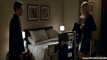 charlize theron bares big tits in the italian job 2003 scene