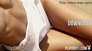 Petite blonde Cara Mell seductively strips nude on sun-kissed beach