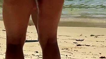 beach threesome heats up as he yanks bikini aside for deep cock thrusts