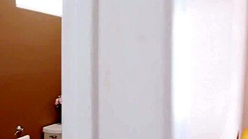 Young Stud and Busty Milf Soak in Dirty Bath Play