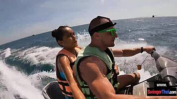 Asian girlfriend gives blowjob in public on jetski