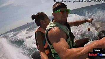 Asian girlfriend gives blowjob in public on jetski