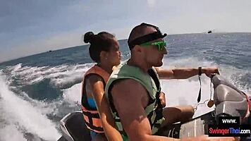 Asian girlfriend gives blowjob in public on jetski