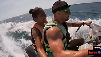 Asian girlfriend gives blowjob in public on jetski