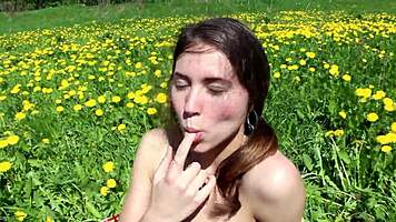 Ananta masturbates on sunny field