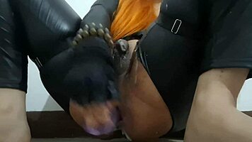 Redhead trans in leather gets anal creampie and gape