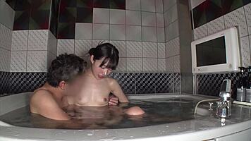 Petite woman performs oral and bath sequence