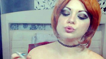 Redhair smoke closeup on webcam