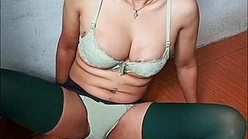 Asian performer engages in private crossdressing activity alone