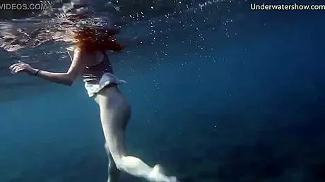 young sluts feel liberated swimming naked alone