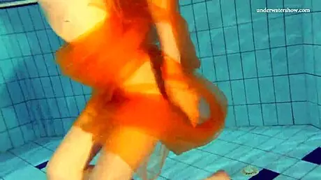 Nastya strips clothes and shows body in pool