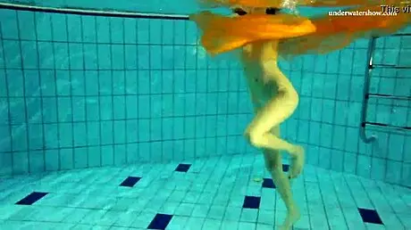 Nastya strips clothes and shows body in pool