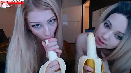 Two Brunette Babes Suck Bananas On Webcam