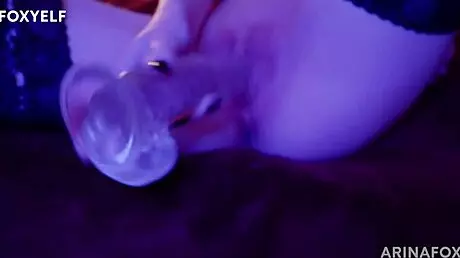 Redhead Arinafox masturbates with dildo while parents are away, shaved pussy solo fun.