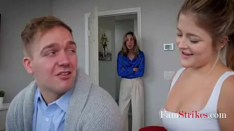 A seductive milf and bimbo stepsis engage in a threesome with a guy, exploring pussy and group fucking.